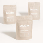 Three packages of bouche mouth tape on a white background