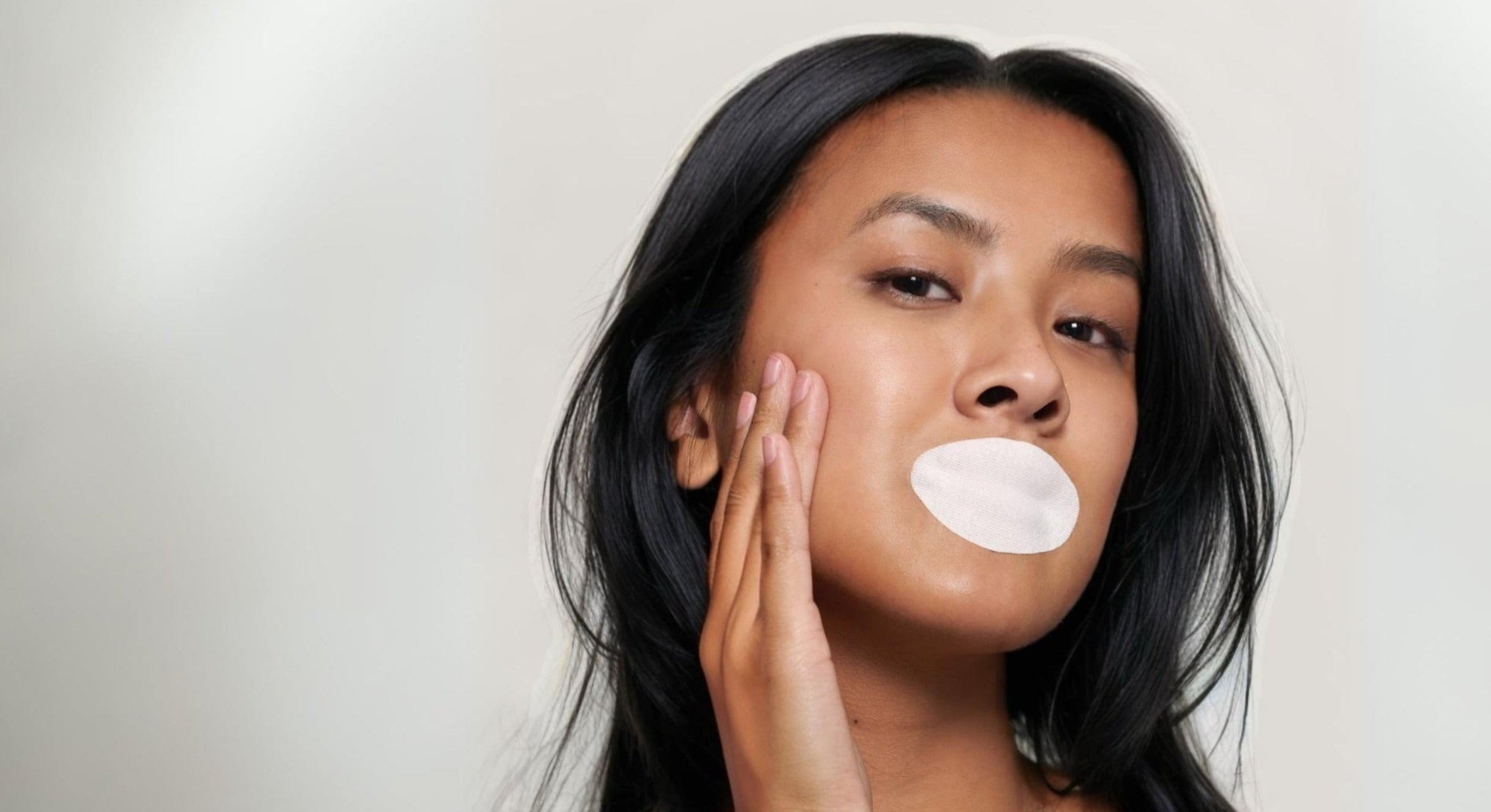 Girl with mouth tape