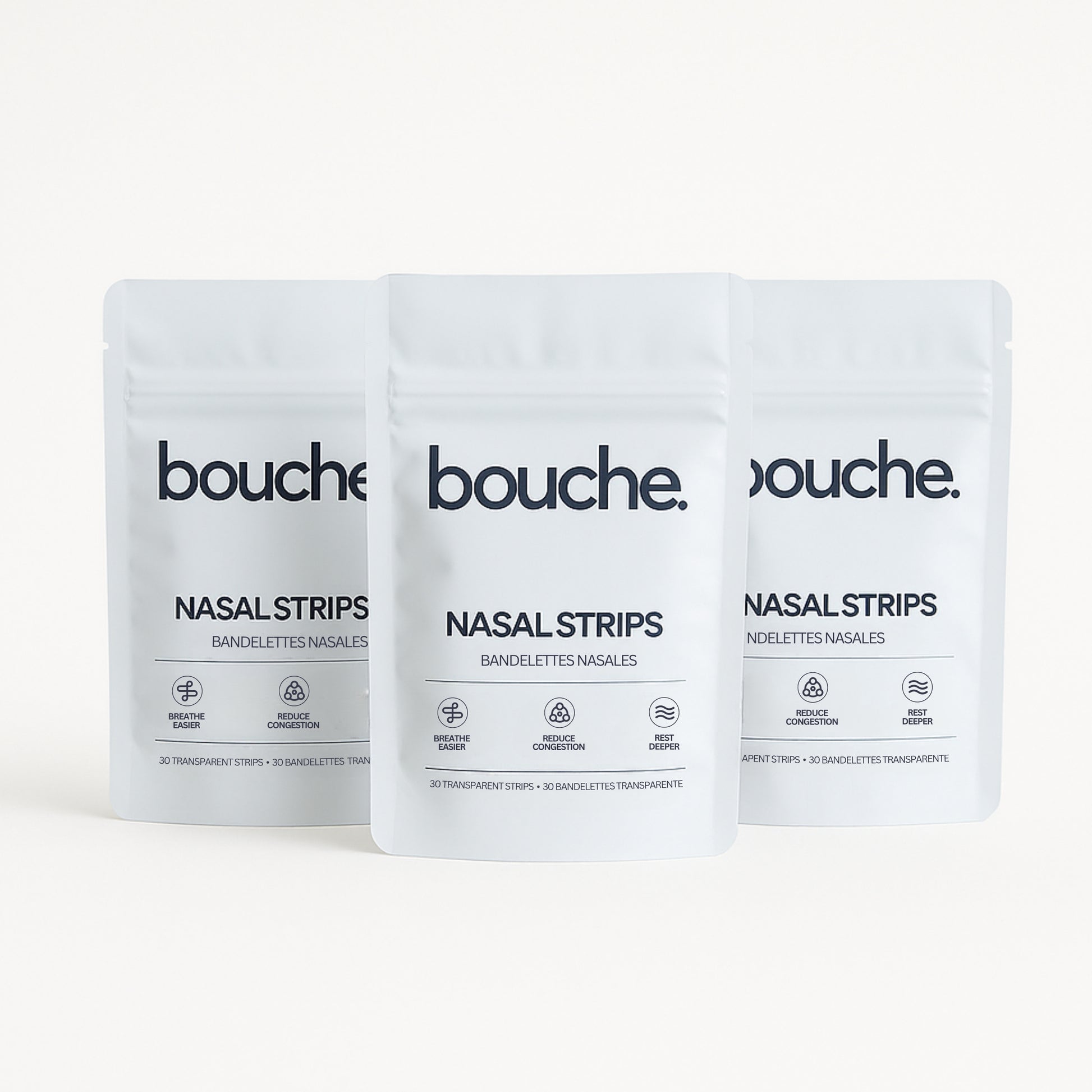 Three packages of bouche nasal strips on a white background